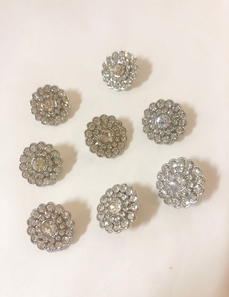 Blingknapp i metall og glass